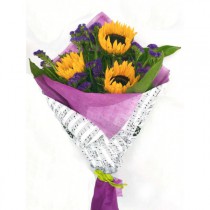 Bright bouquet with sunflowers and statice